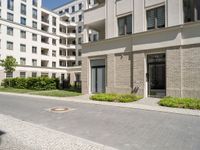 a paved area in the middle of a bricked - up courtyard is pictured here