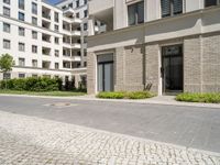 a paved area in the middle of a bricked - up courtyard is pictured here