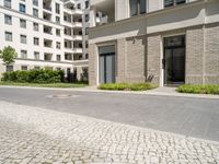 a paved area in the middle of a bricked - up courtyard is pictured here