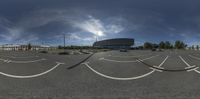 a parking lot is seen in this spherical image while fish eye view is very high