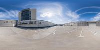 fish eye view of a public storage area at an airport and car park parking lot