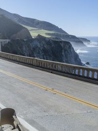 the bridge is designed to cross over the ocean as if there are cliffs at its end