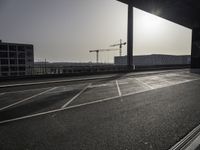 Black-and-white asphalt road surface under sunlight