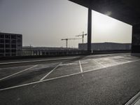 Black-and-white asphalt road surface under sunlight