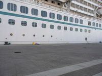 the large cruise ship is docked in the dock for passengers to board or leave the area