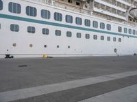 the large cruise ship is docked in the dock for passengers to board or leave the area