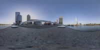 there is a 360 - ray view of a river side dock in the city of boston