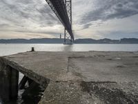 Break of Day on Lisbon Coastal Bridge