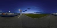 360 - vision of a highway with two road curves in the front and a sky in the back