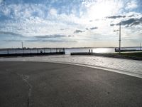 this is an image of a street and water view from the side of a highway