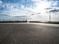 this is an image of a street and water view from the side of a highway