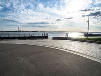 this is an image of a street and water view from the side of a highway