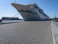 Bremen Harbor Boats and Cruise Ship on Asphalt Road in Bremerhafen, Germany