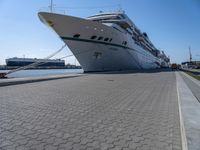 Bremen Harbor Boats and Cruise Ship on Asphalt Road in Bremerhafen, Germany