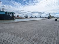 Bremen Harbor: A Daytime View of Clouds and Boats