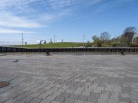 an empty plaza in a deserted place with no people standing around it and a cloudy sky