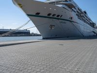 a cruise ship is tied up next to the dock area of the harbor of miami