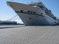 a cruise ship is tied up next to the dock area of the harbor of miami