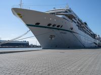 a cruise ship is tied up next to the dock area of the harbor of miami