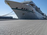 a cruise ship is tied up next to the dock area of the harbor of miami