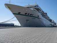 a cruise ship is tied up next to the dock area of the harbor of miami