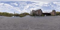 the old brick house is seen through the fish - eye lenses of this image