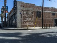 the storefront of a brick store is shown here in this picture taken on a street corner