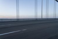 Bridge at Dawn on Asphalt Road