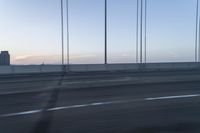 Bridge at Dawn on Asphalt Road