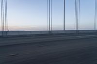 Bridge at Dawn on Asphalt Road