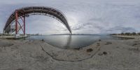 the fish eye lens view shows a bridge as it's in motion through the water