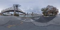 the camera is 360 - eye view of this intersection as it travels by the bridge