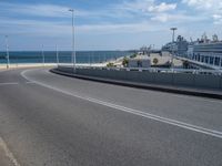 Bridge in Spain: Leading to a Bustling Harbor in Barcelona