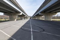 there are many bridges connecting in one area of the road to each other in a parking lot