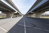 there are many bridges connecting in one area of the road to each other in a parking lot