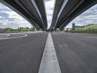 three curved freeway bridges over a wide road in the united states photo by mike stettles