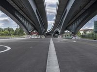 three curved freeway bridges over a wide road in the united states photo by mike stettles