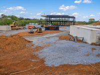 Building Construction on Gravel Road in the USA