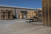 large stacks of pallets in the warehouse area at a building site for palling