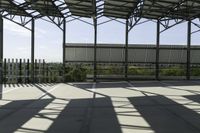 a walkway through the building under construction with an overhang overlay at the top