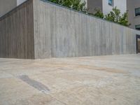 Spain's Business District: A Concrete Wall and Paver Surface