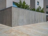 Spain's Business District: A Concrete Wall and Paver Surface