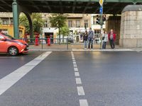 the view under the highway, on a rainy day of the city street and on the streets with buildings and bicycles