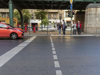 the view under the highway, on a rainy day of the city street and on the streets with buildings and bicycles