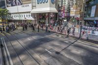 people are traveling by a street near the busy streets in tokyo with a single car