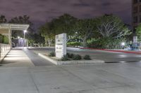 the trees around the entrance are lit up at night, which is why we call the plaza