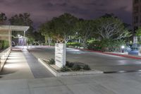 the trees around the entrance are lit up at night, which is why we call the plaza