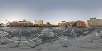 a series of virtual images shows the road in front of some buildings and cars in a parking lot