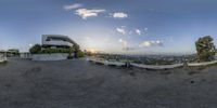 a 360 - vision view of a hill, with an apartment at the top of the mountain