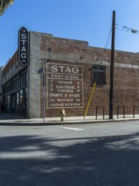 this is an image of a large brick building that has the words'stago studio and restaurant, in english